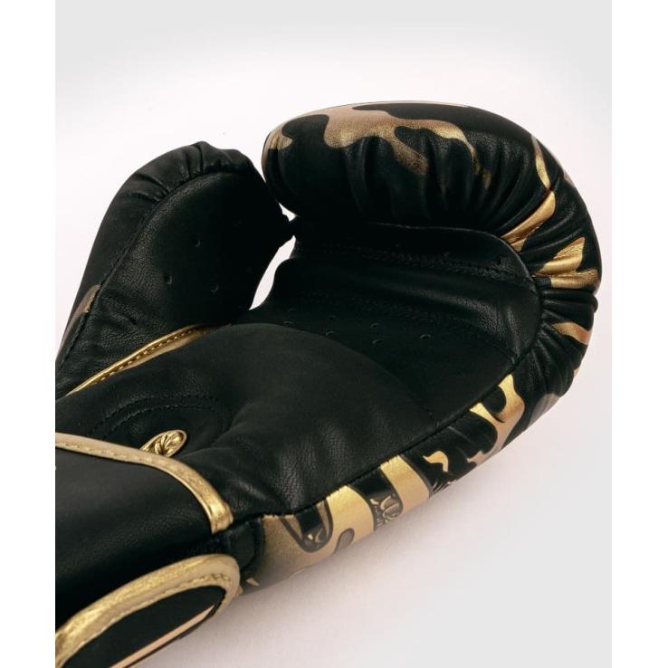 Venum Dragon's Flight boxing gloves black / gold